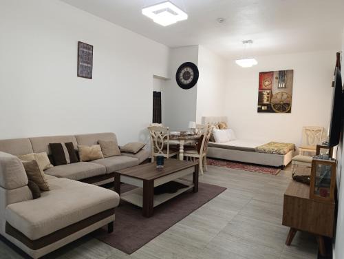 Al Nahda Apartment | entire Luxury and family One Bed Room living Room in front Of Beach