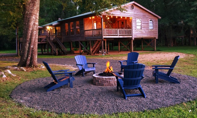 Lucedale Cabin | Escape City Life at this Exceptional Cabin Retreat with River Views.