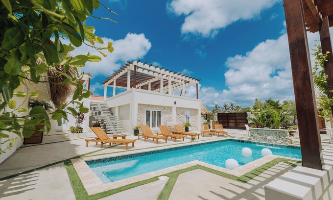 De Bruynewijk Resort | Escape to Eva Resorts in Savaneta, Aruba, a boutique luxury retreat with six unique apartments accommodating up to 14 guests. Just steps from turquoise waters, the resort features a saltwater pool, rooftop terraces with sunset views, and more.