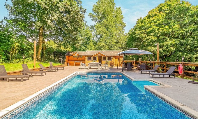 Cowbridge Cottage | Escape to rustic charm and relaxation at this one-bedroom log cabin near Cowbridge.