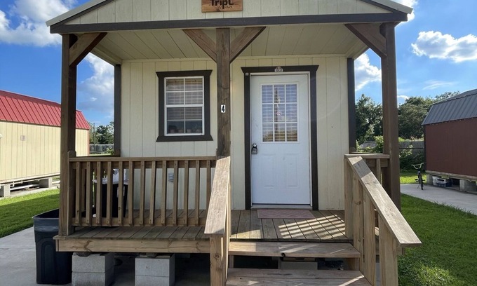 Brazoria Cabin | Escape to Serenity: Discover the Rustic Charm of the Wade Cabin at Tripl RV Park