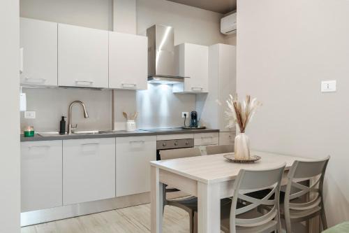 Sant'Eufemia Apartment | ESSENZA MODERNA Design & Quiete