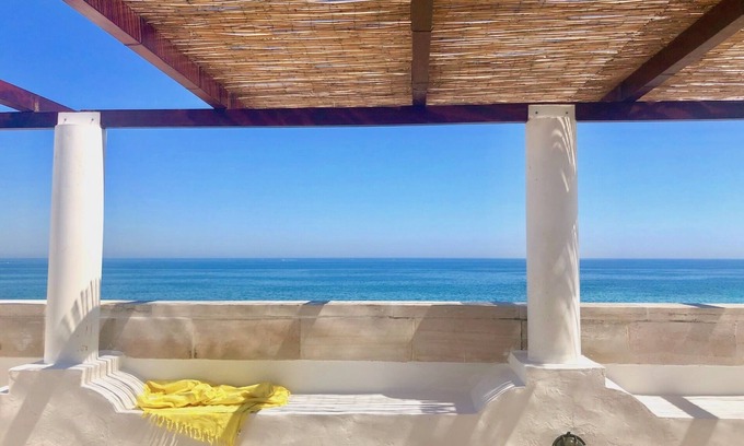 L'Assunta Apartment | Exclusive and charming roof terrace apartment just 20 m from the sea
