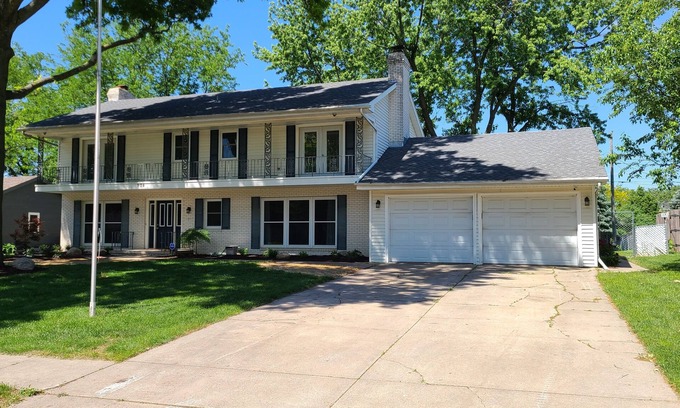 West Omaha House | Executive Rental - 4 bed, 4 bath fully furnished home W/L2 EV Charging Station