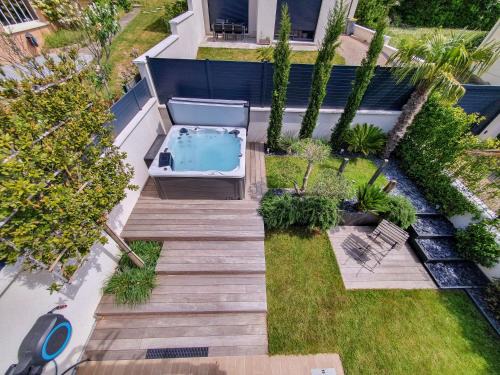 Orgeval House | EXIGEHOME - Chambre d'hôte avec jacuzzi et jardin paysagé, partagé