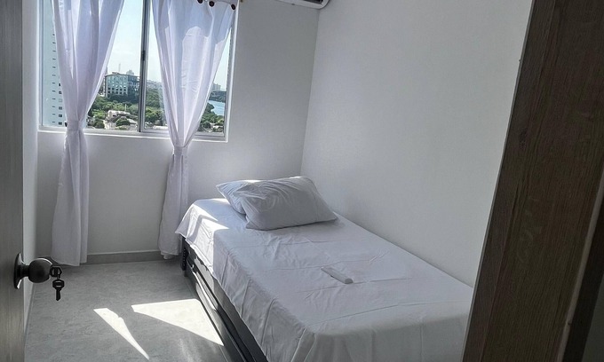 Torices Apartment | Family-Friendly Haven: Modern Amenities & City Views