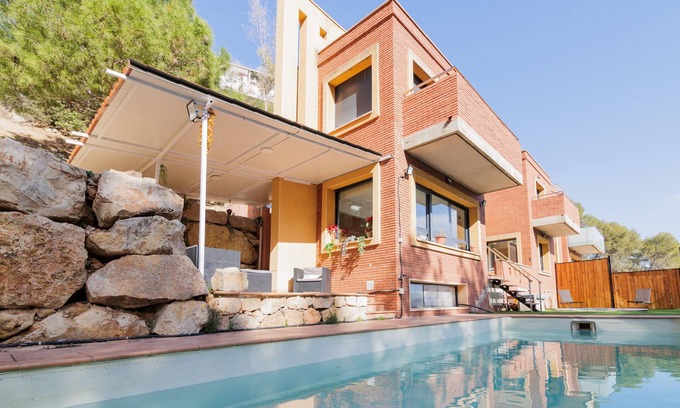 Cervello Ski Chalet | Family Friendly Chalet 'Can Camarasa' with Sea View, Wi-Fi and Air Conditioning