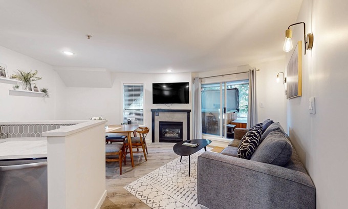 Village North Apartment | Family-friendly condo with gas fireplace, kitchen & washer/dryer