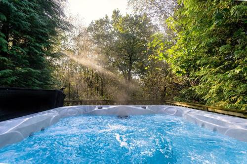 Farley House | Farley, woodland lodge with hot tub for 8