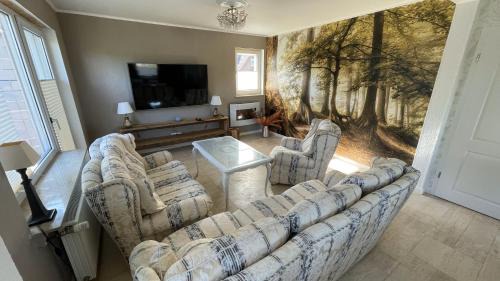 Bad Hersfeld House | Ferienhaus Platzhirsch in Bad Hersfeld mit Garten, 2 Bäder, 3 Schlafzimmer & Küche - gratis Parkplätze