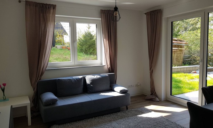 Sankt Johann Apartment | Ferienwohnung Eifelglück mit Terrasse