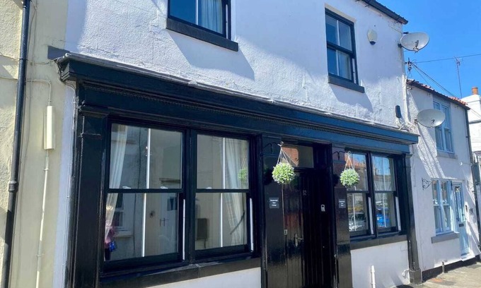 Flamborough House | Flamborough Rock House & Cottage - village centre location - sleeps 12