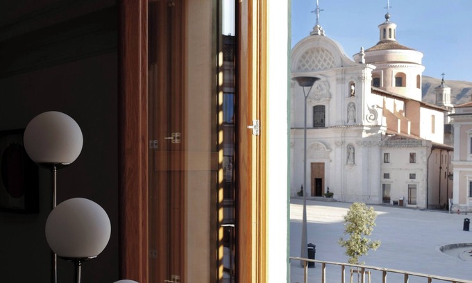 L'Aquila House | Foot of the Square