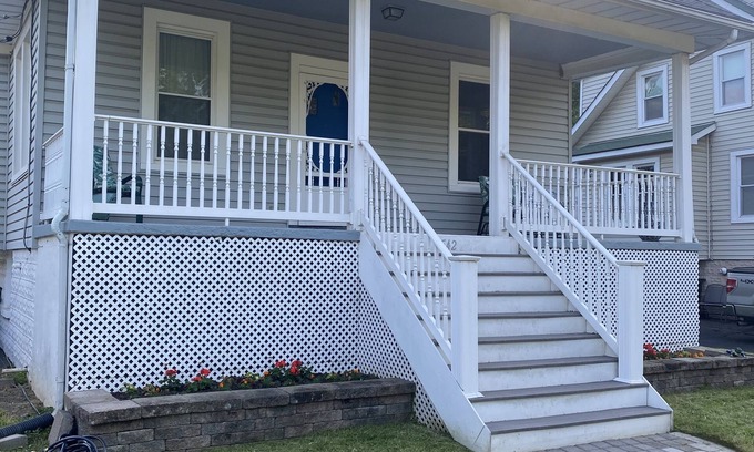 Elkridge House | Four bedrooms, porch and parking! Pet-friendly with a large fenced yard.