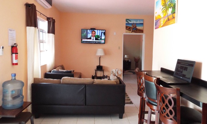 Ladyville House | Free Parking. Wifi. Kitchen. Washer Dryer. Air Conditioning. Close to Airport.