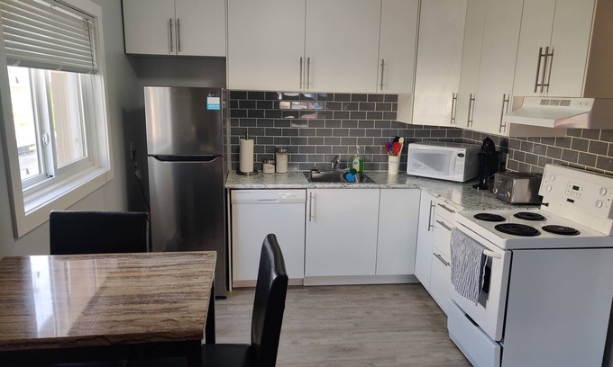 Regina Apartment | Fully updated 1 Bedroom with dedicated parking!