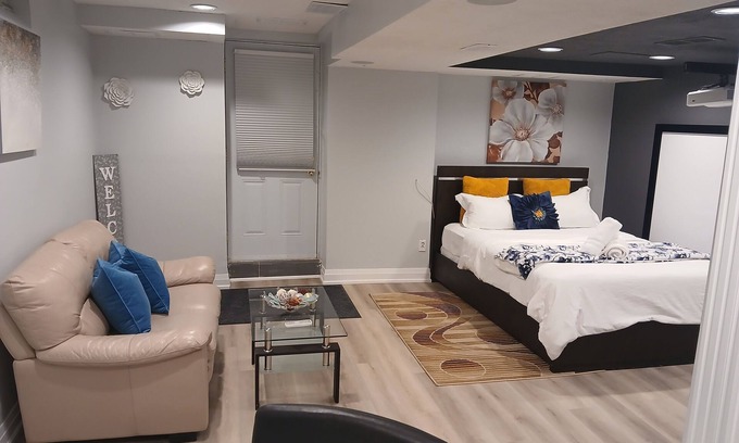 Lisgar Apartment | furnished basement studio, with1 queen bed, a kitchenette, and 1 bathroom. n
