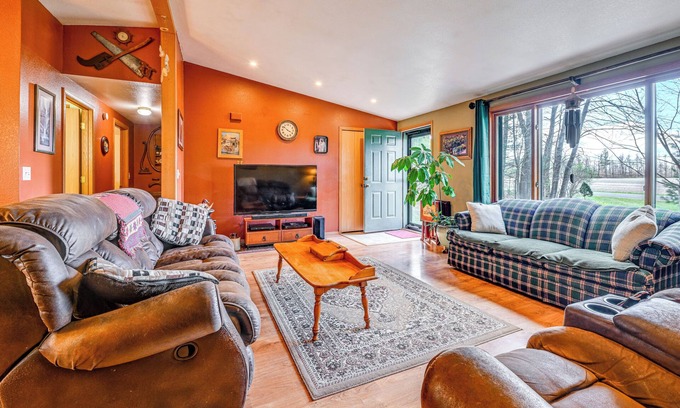 Manawa House | Furnished Deck w/Forested Views: Manawa Home!