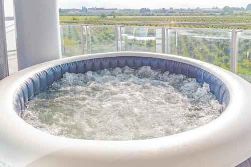 Madonna dell'Olmo Apartment | Glass House