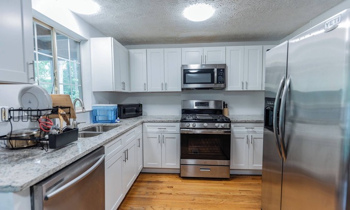 Stone Mountain House | Gorgeous 4-Bed Home Sleeps 20, Near Airport & Downtown!