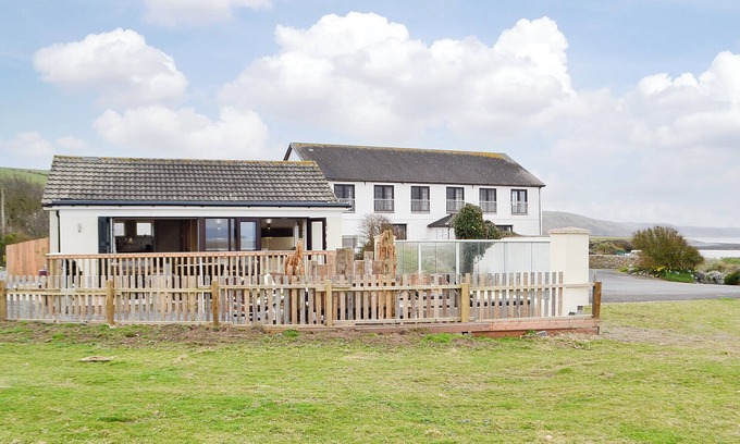 Llansantffraed Cottage | Gorgeous glass fronted property on ground floor level with sea views.