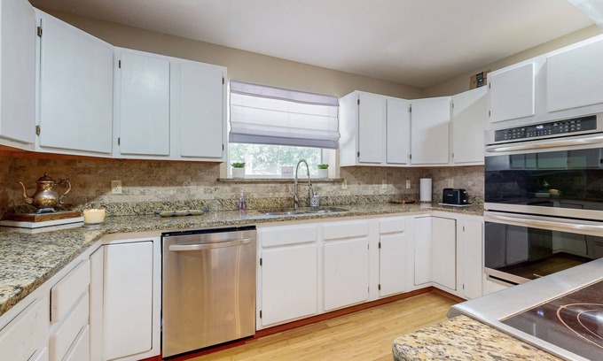 Hoyt House | Gorgeous Lakefront Home, private dock and short walk to beach