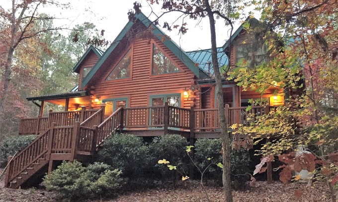 White Oak Cabin | Gorgeous lakefront log home on secluded cove with private beach and boat dock