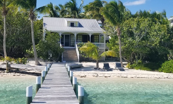 Lubbers Quarters Cay House | Green Bananas Cottage with sandy beach and private dock