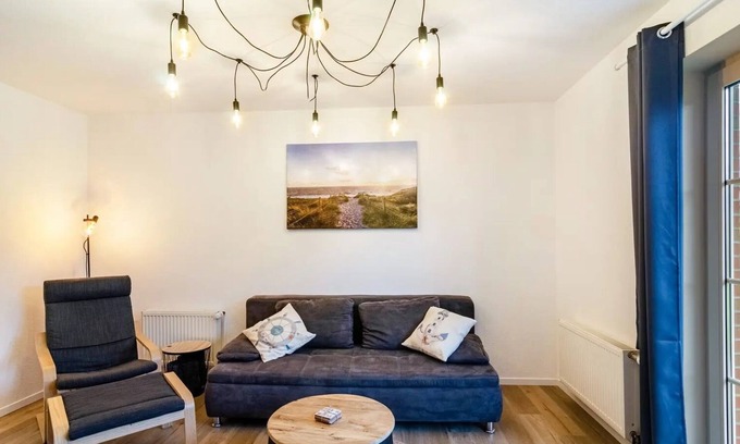 Neßmersiel Apartment | Ground floor apartment with terrace for 3 pers. max. 4 pers. Pets allowed Wallbox