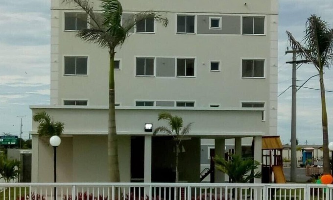 Macae Apartment | Ground floor apartment with private area and lawn