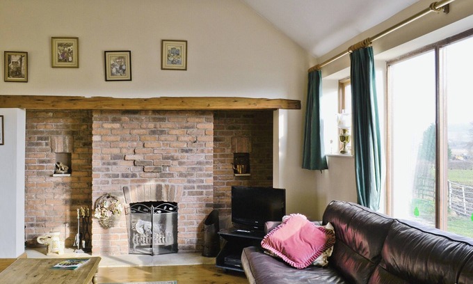 Burythorpe Cottage | Ground Floor: nLiving room: TV, Open FirenDining room.