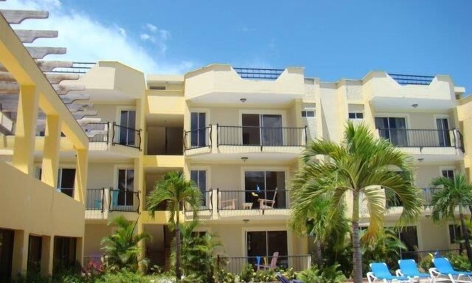 El Batey Apartment | Guest-Friendly 2-bedroom top-floor condo with pool in the center of Sosua