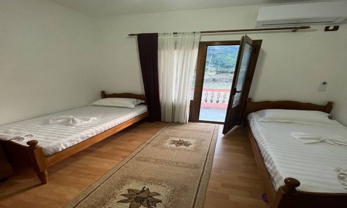 Permet Villa | Guesthouse Space in Përmet provides accommodations with a garden.