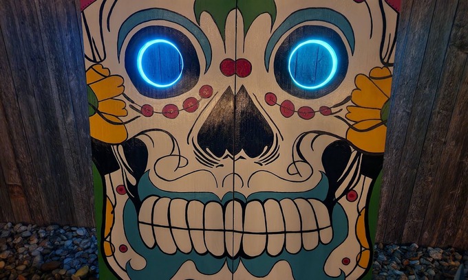 Harlandale House | Halloween House sugar skull corn hole, life size Checkers, Horseshoe, Foosball