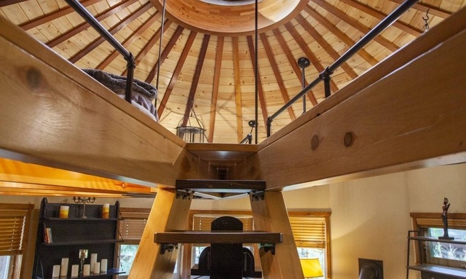 Rough and Ready Apartment | Handcrafted Roundhouse studio & loft. Large sky window + private outdoor shower
