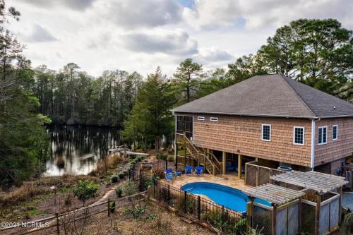 Myrtle Grove House | Heated Private Pool, Pond Views, Fishing, Mins to Carolina Beach