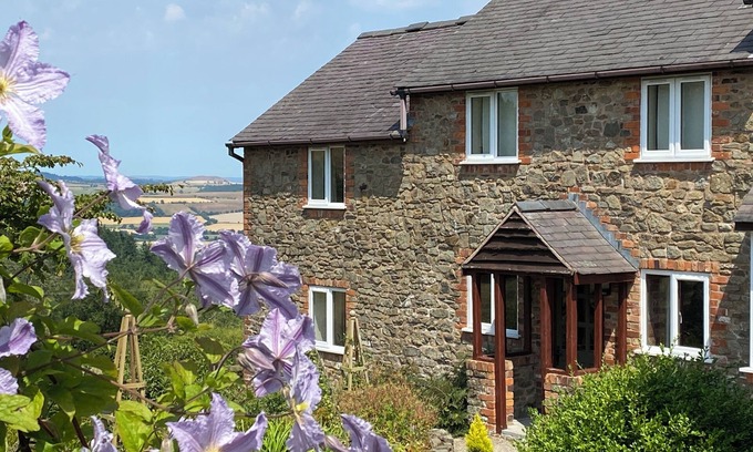 Bromlow Cottage | HERON COTTAGE, pet friendly, with open fire in Hope, Shropshire