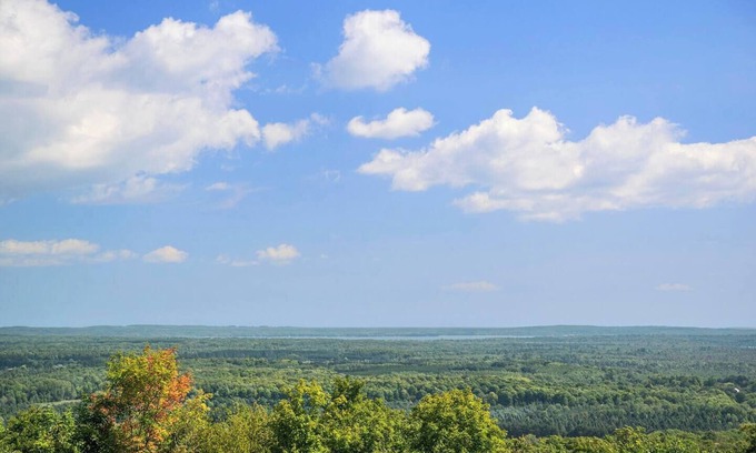 Alanson House | High In The Tress Overlooking Multiple Lakes