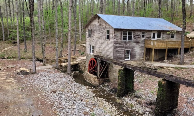Cullman Cabin | Historic Cabin in a natural setting with waterfalls and covered bridge