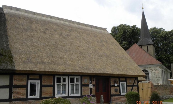 Putzar House | Historisches Küsterhaus Reetdachträume