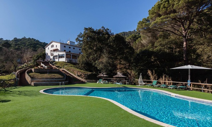 Tordera House | Holiday Home "Mas del Gall - Casa Nova" with Mountain Views, Pool, Garden and Wi-Fi
