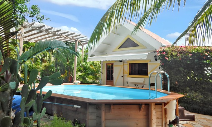 Le Vauclin Ski Chalet | Homerez - Comfortable Chalet in Vauclin with Private Pool