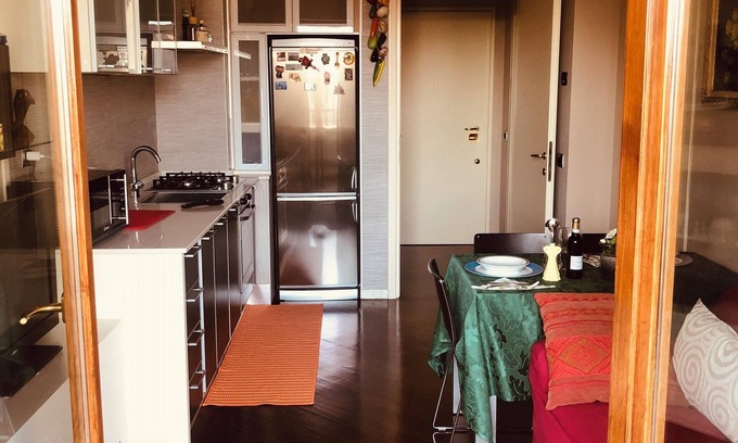 Monza Apartment | Homerez - Elegant Apartment in Monza with Garden View