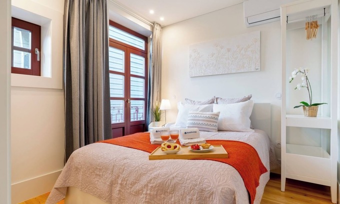 Guimaraes Apartment | HostWise - Bright and Cozy Flat w/Balcony