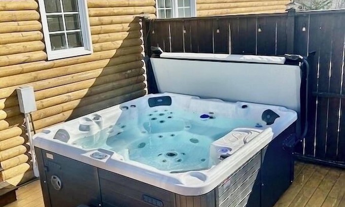 Lot 16 House | Hot tub, Play area, deck, fully loaded Log home seconds from a Provincial Park.