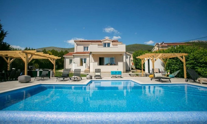 Kastel Stafilic Villa | House Longo located near center of Trogir , with private heating swimming pool