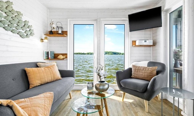 Schleswig Boat Rental | Houseboat moments of happiness for 4 people with roof terrace on the Baltic Sea fjord Schlei