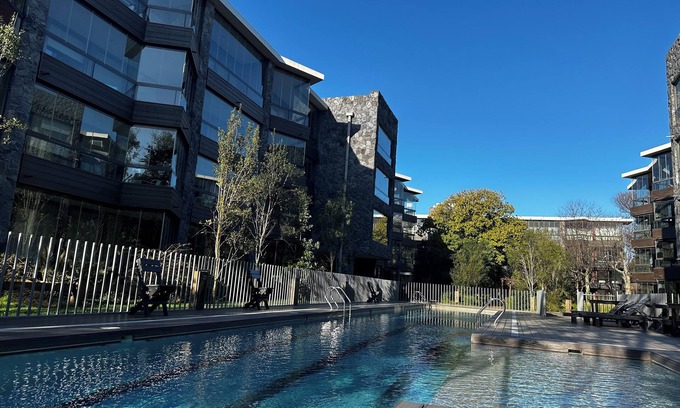 Pucon Apartment | Ideal for relaxation: comfortable and modern apartment with pool, on main street