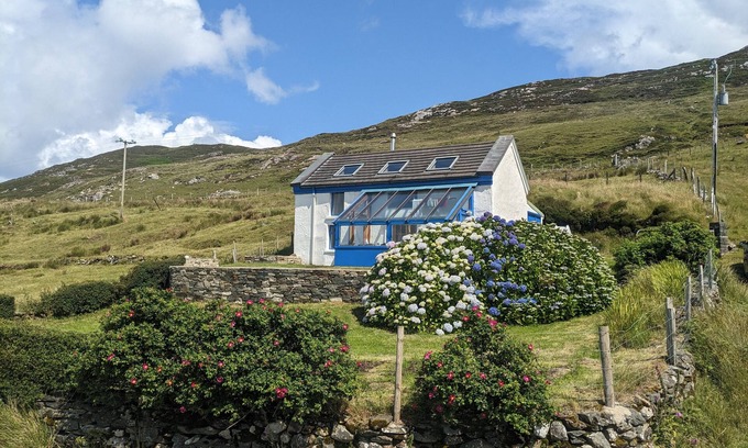 Renvyle Cottage | Idyllic Connemara cottage with sweeping sea, island and mountain views.