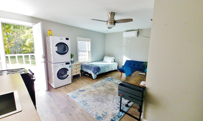 Norway Apartment | In unit laundry. AC, Modern Studio with desk and parking
